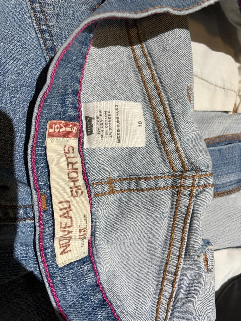 Vintage Y2K LEVIS 515 Light Blue Denim Jean Shorts holes used Sz 10